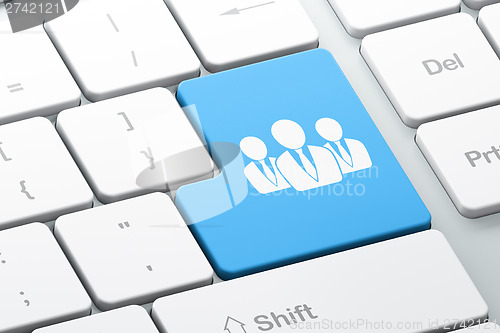 Image of Marketing concept: Business People on computer keyboard backgrou