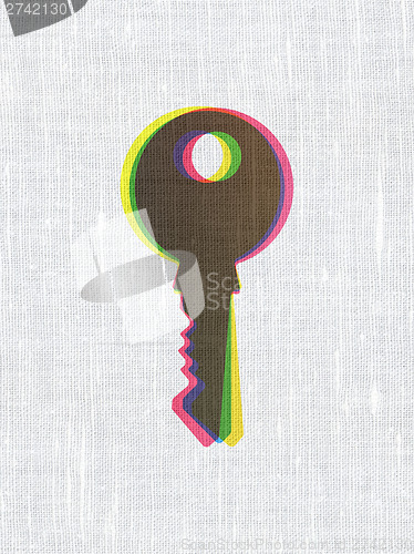 Image of Security concept: Key on fabric texture background