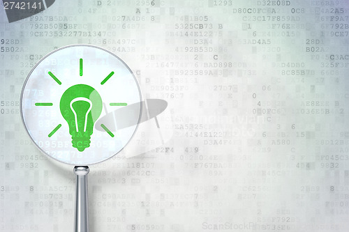 Image of Finance concept:  Light Bulb with optical glass on digital backg