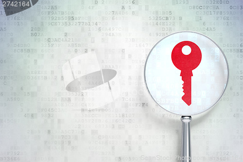 Image of Security concept:  Key with optical glass on digital background