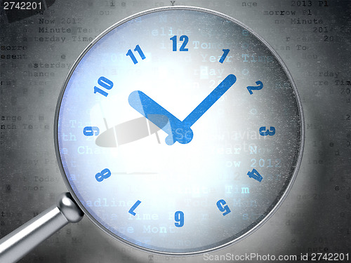 Image of Time concept:  Clock with optical glass on digital background