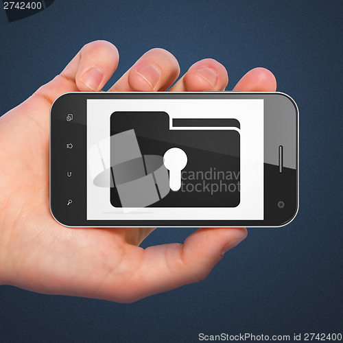 Image of Business concept: Folder With Keyhole on smartphone