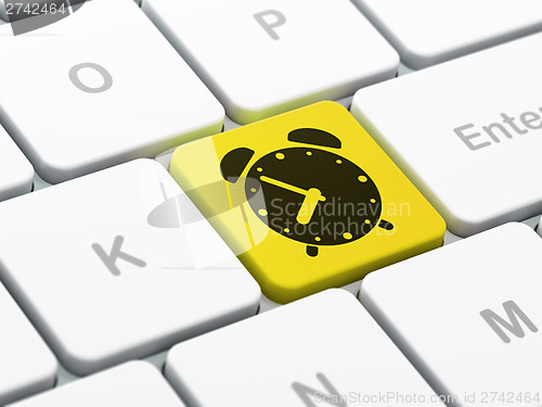 Image of Timeline concept: Alarm Clock on computer keyboard background