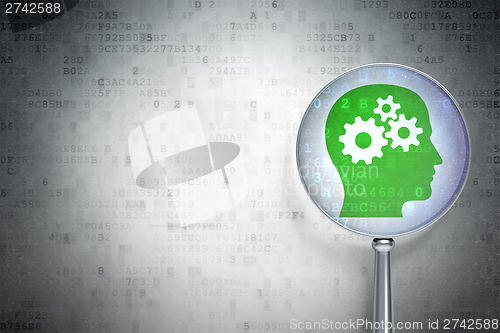 Image of Business concept:  Head With Gears with optical glass on digital