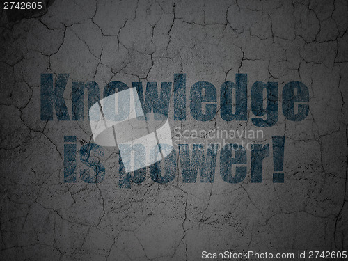 Image of Education concept: Knowledge Is power! on grunge wall background