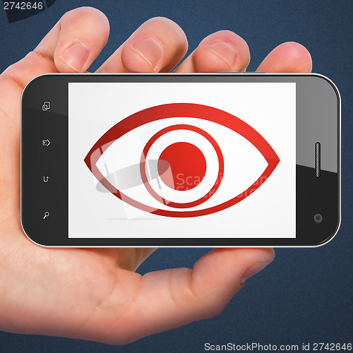 Image of Protection concept: Eye on smartphone