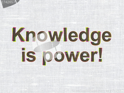 Image of Education concept: Knowledge Is power! on fabric texture backgro