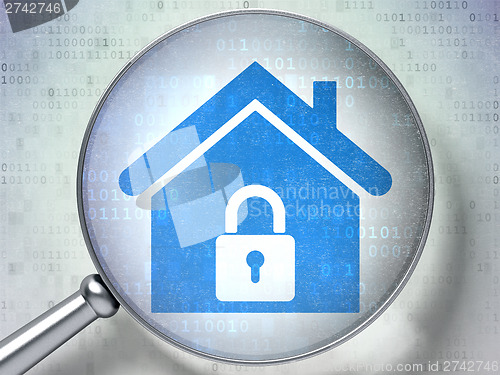 Image of Safety concept:  Home with optical glass on digital background
