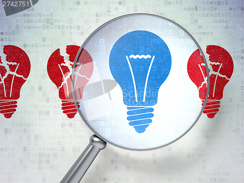 Image of Business concept: Lightbulb with optical glass on digital backgr