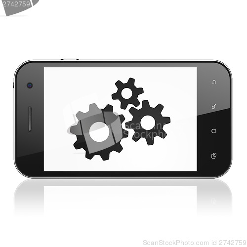 Image of Advertising concept: Gears on smartphone