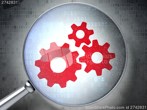 Image of Web design concept:  Gears with optical glass on digital backgro
