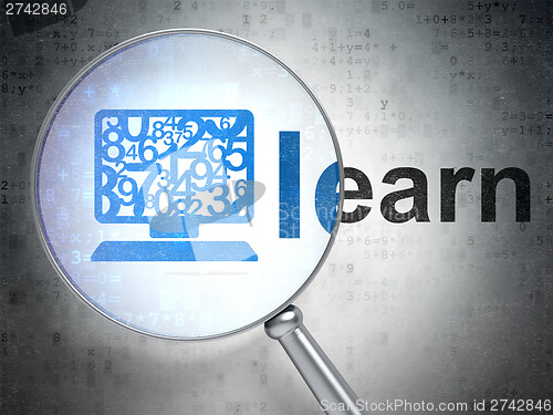 Image of Education concept: Computer Pc and Learn with optical glass