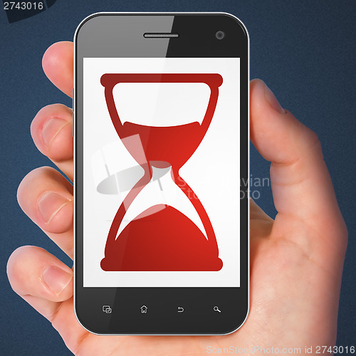 Image of Timeline concept: Hourglass on smartphone