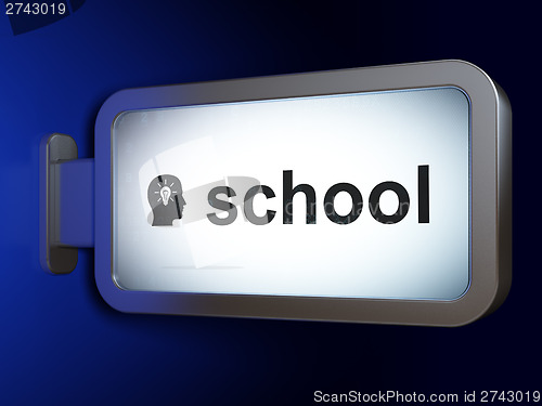 Image of Education concept: School and Head With Light Bulb on billboard