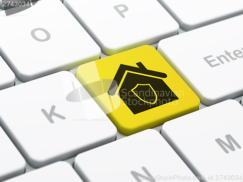 Image of Security concept: Home on computer keyboard background
