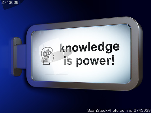 Image of Education concept: Knowledge Is power! and Head With Gears on bi