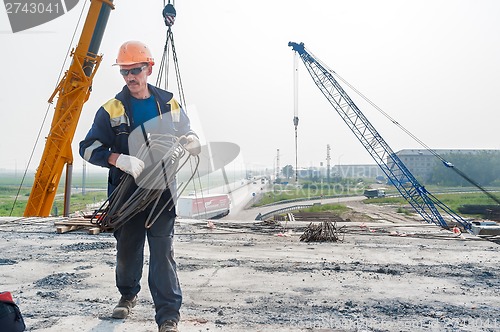 Image of Worker on construction of bridge