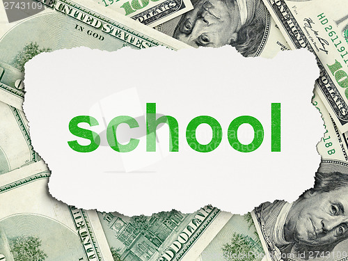 Image of Education concept: School on Money background