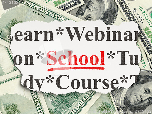 Image of Education concept: School on Money background