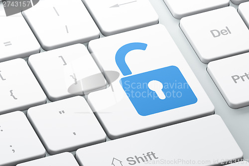 Image of Data concept: Opened Padlock on computer keyboard background