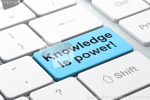 Image of Education concept: Knowledge Is power! on computer keyboard back