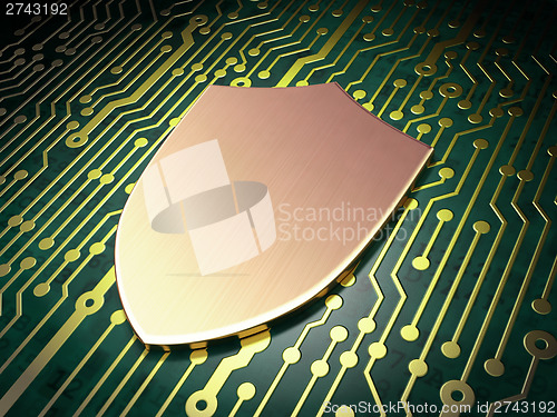 Image of Security concept: Shield on circuit board background