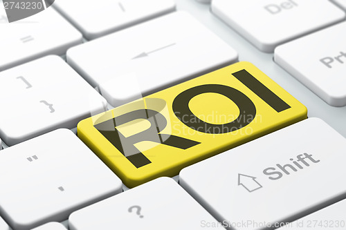 Image of Finance concept: ROI on computer keyboard background