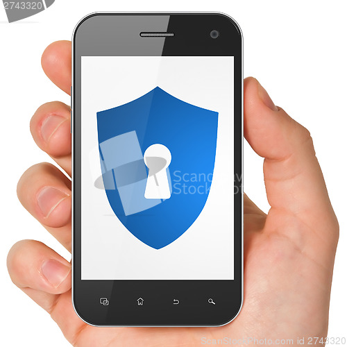Image of Security concept: Shield With Keyhole on smartphone