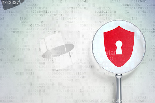 Image of Safety concept:  Shield With Keyhole with optical glass on digit