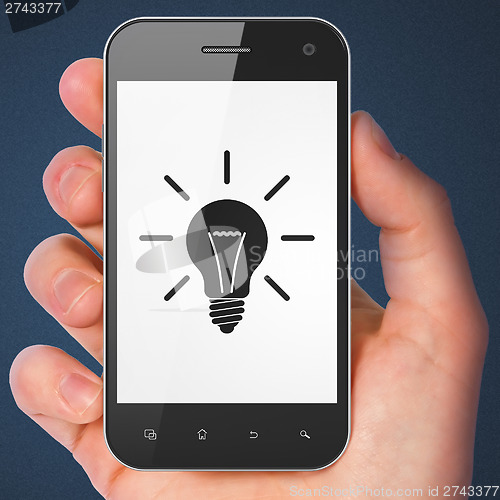 Image of Business concept: Light Bulb on smartphone