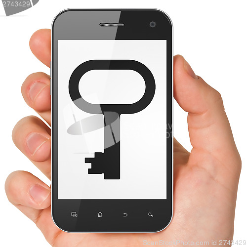 Image of Security concept: Key on smartphone