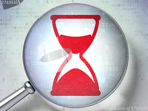 Image of Timeline concept:  Hourglass with optical glass on digital backg
