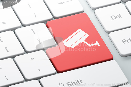 Image of Protection concept: Cctv Camera on computer keyboard background