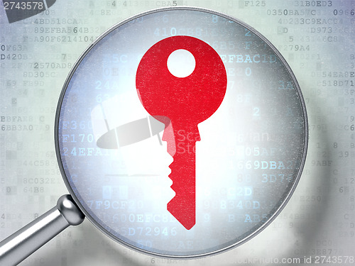 Image of Privacy concept:  Key with optical glass on digital background