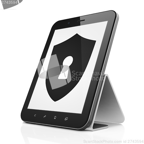 Image of Security concept: Shield With Keyhole on tablet pc computer