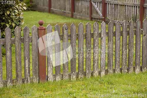 Image of Weathered Fence and Green Grass