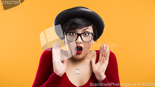 Image of Astonished nerd girl