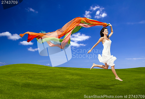 Image of Jumping with a colored tissue