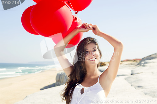 Image of Girl with red ballons