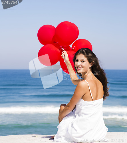 Image of Girl with red ballons