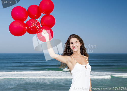 Image of Girl with red ballons