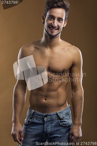 Image of Shirtless male smiling