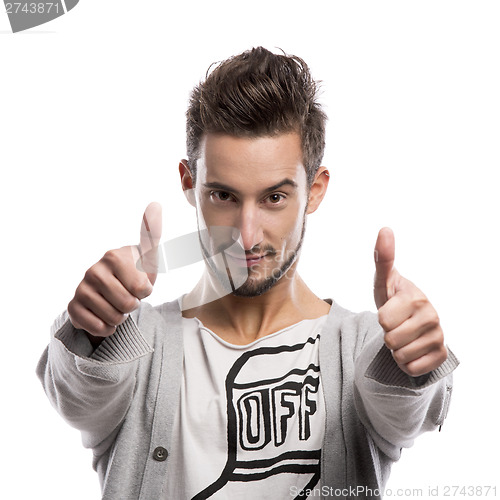 Image of Young man with thumbs up