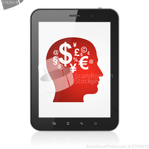 Image of Education concept: Head With Finance Symbol on tablet pc compute