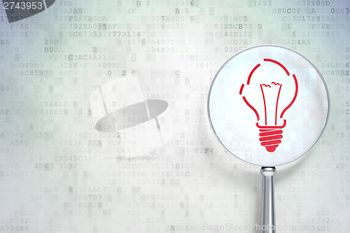 Image of Business concept:  Light Bulb with optical glass on digital back