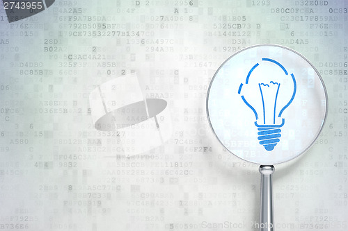 Image of Finance concept:  Light Bulb with optical glass on digital backg