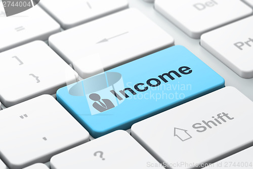 Image of Business finance concept: Business Man and Income on computer ke