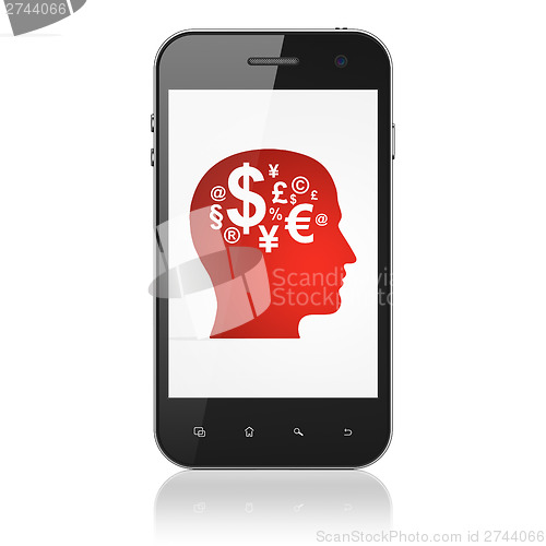 Image of Education concept: Head With Finance Symbol on smartphone