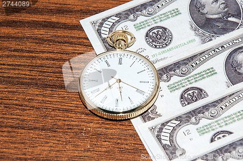 Image of Pocket watches and money