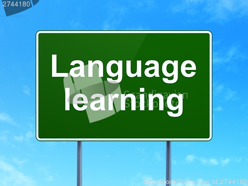 Image of Education concept: Language Learning on road sign background